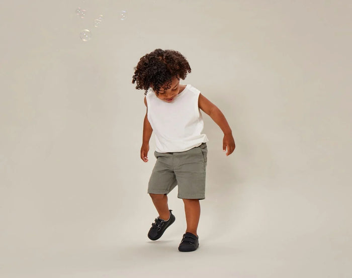 Child wearing Ten Little Everyday Original - All Black. Available at www.tenlittle.com