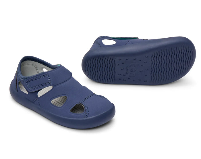 Side and outsole traction view of Ten Little Everyday Sandals - Slate Blue. Available at www.tenlittle.com