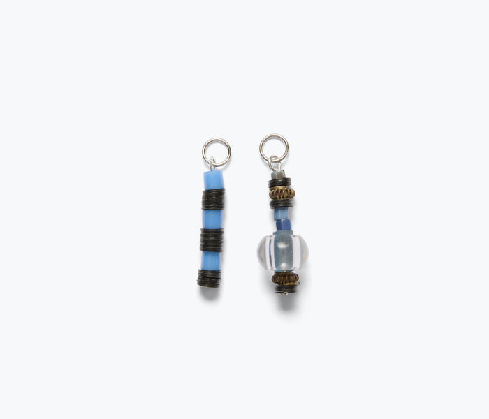 Blue beaded lace totems accessory by Don't Let Disco, featuring intricate beaded design and lace details.
