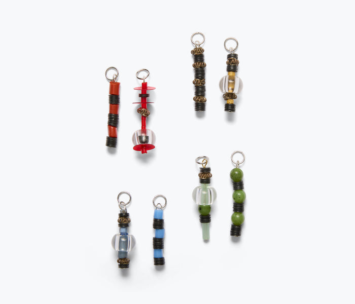Group of Don't Let Disco exclusive beaded lace totems accessories with colorful intricate beadwork and lace details.