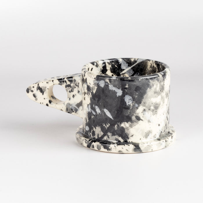 Other side of black, white and gray EXP ceramic splatter mug by Peter Shire and Echo Park Pottery.