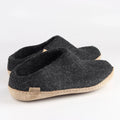 Felt slippers from Denmark made by Glerups on white background.
