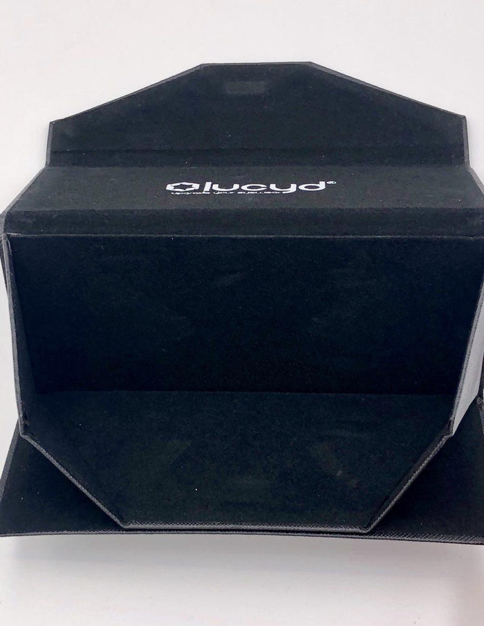 A black, foldable storage box called the Fold Flat Case doubles as a durable glasses case, with the Lucyd brand name printed in white inside the lid and shown from the front against a plain white background.