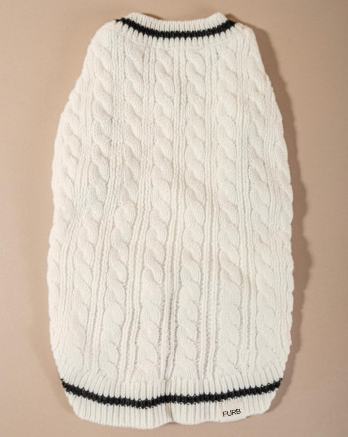Chic ivory cable knit sweater vest for small and medium dogs, an essential wardrobe item for cooler days.