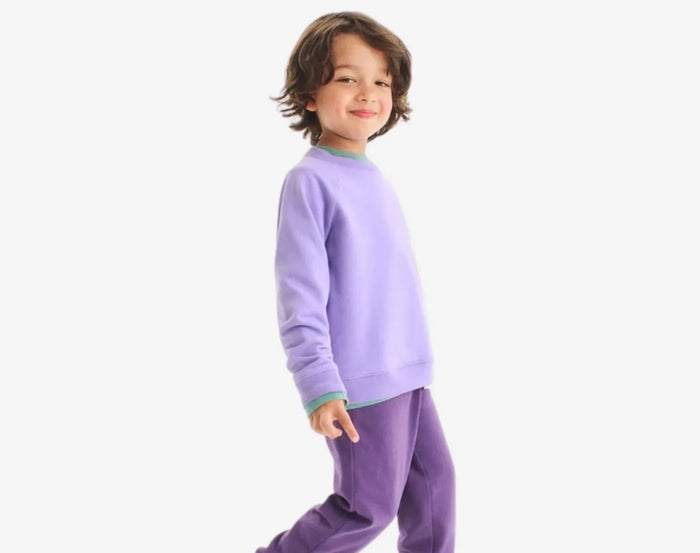 Boy wearing Primary French Terry Sweatpants - Grape. Available at www.tenlittle.com