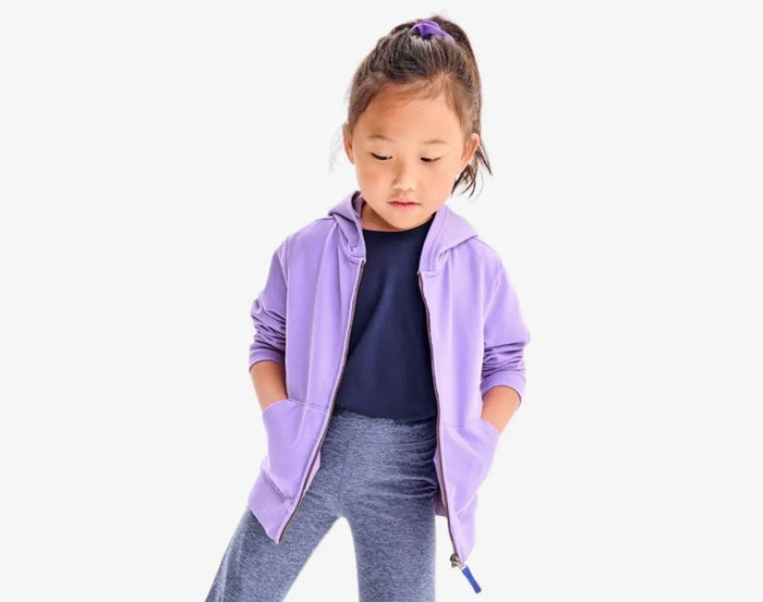 Child wearing Primary French Terry Zip Hoodie - Iris. Available at www.tenlittle.com