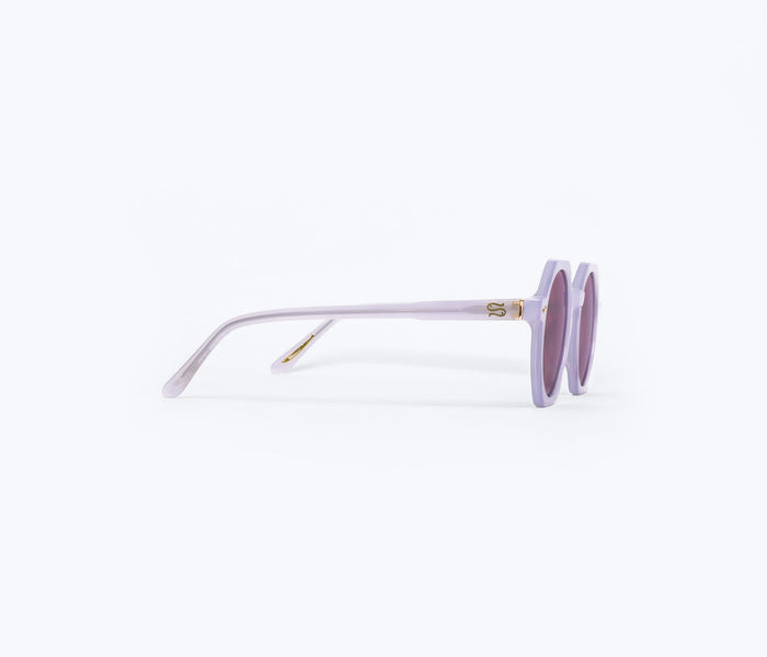 Side view of Freda Salvador FS X Sardine Millie sunglasses with orchid-colored frames and sleek design.