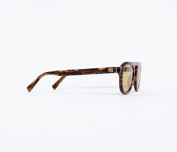 Sardine FS X Stevie sunglasses with tortoise frames, side view showing stylish accessories for sun protection and fashion.