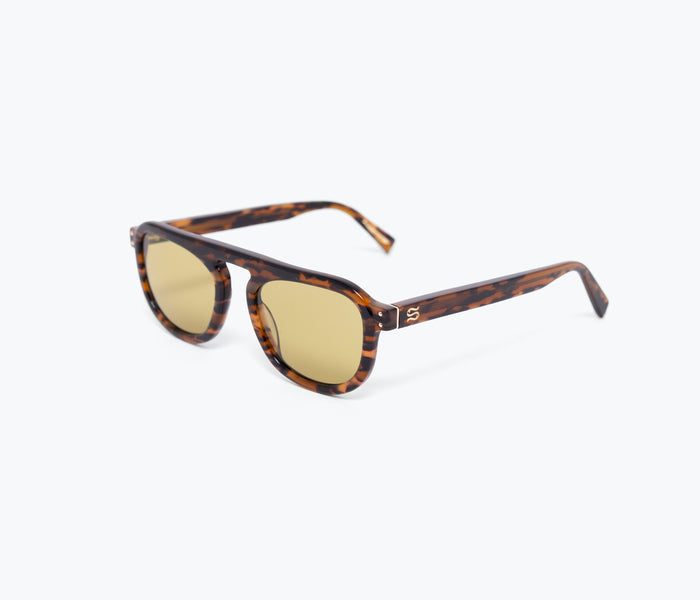 Sardine FS X Stevie tortoise sunglasses with round frames and dark lenses, shown from the left side.