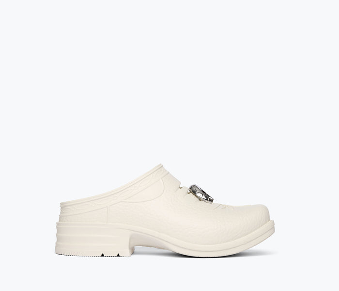 Freda Salvador FS X WESTECH OUTRIDER slip-on mule with charm detail, front view showcasing stylish design and craftsmanship.