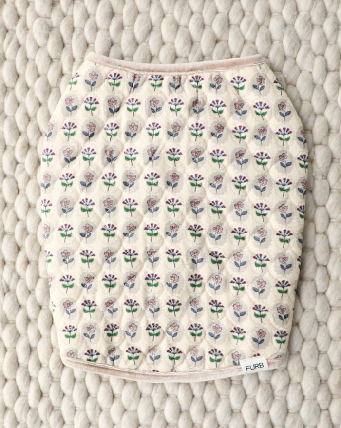 Floral quilted dog vest offering warmth without bulk, great for layering on Mini Aussies, Beagles, Boston Terriers, and active medium sized breeds