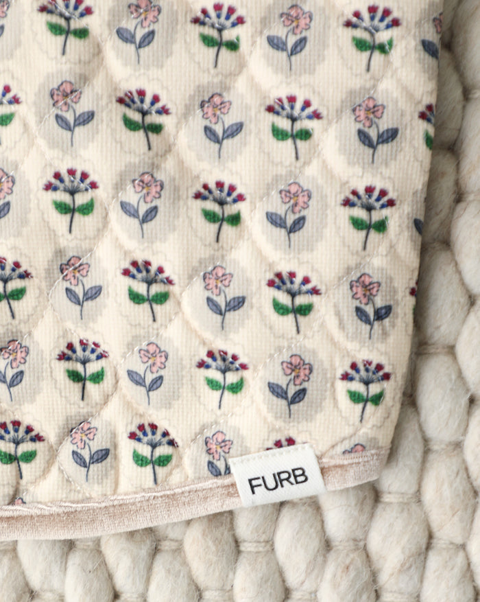 Floral quilted dog jacket vest designed for cozy layering, perfect for spring and fall walks with Boston Terriers, French Bulldogs, and medium dogs