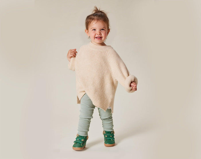 Child wearing Ten Little Furry High Tops - Emerald Green. Available at www.tenlittle.com