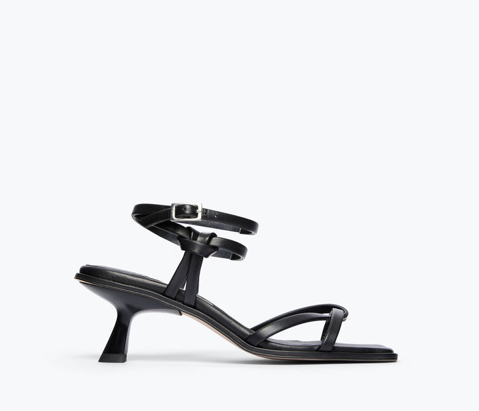 Black Freda Salvador Gianna strappy heeled sandal with calf-height straps, front view showing elegant design and heel detail.