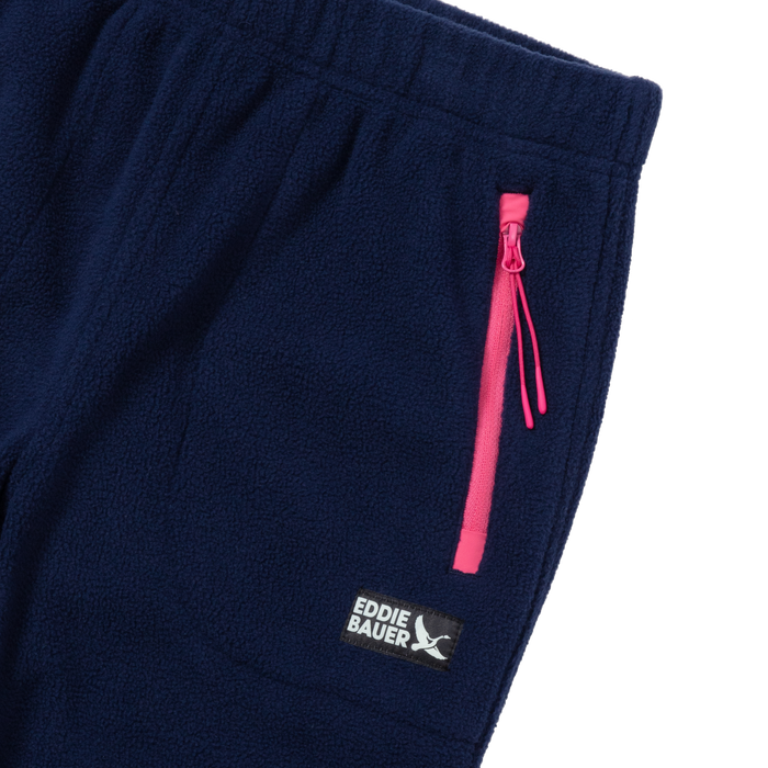 Navy fleece jogger with pink zip pocket and Eddie Bauer logo on leg.