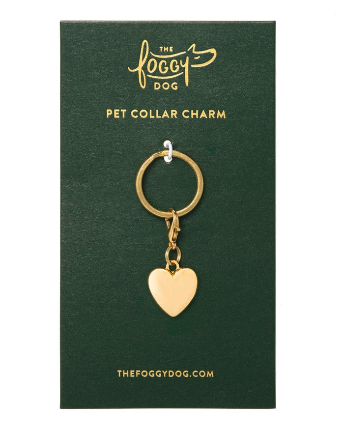 Elegant gold heart charm accessory for dog collars adding sparkle and personality, ideal for giftable pet accessories