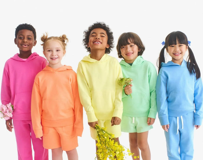 Children wearing Primary Gym Shorts - Goldfish and Buttercup. Available at www.tenlittle.com