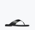 Freda Salvador Halle leather thong sandal in black, featuring a sleek front view with minimalist design and smooth calf leather straps.