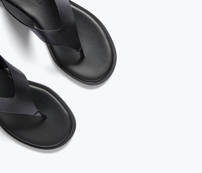 FREDA SALVADOR Halle leather thong sandal in black with calf leather detail, featuring a sleek and stylish design.