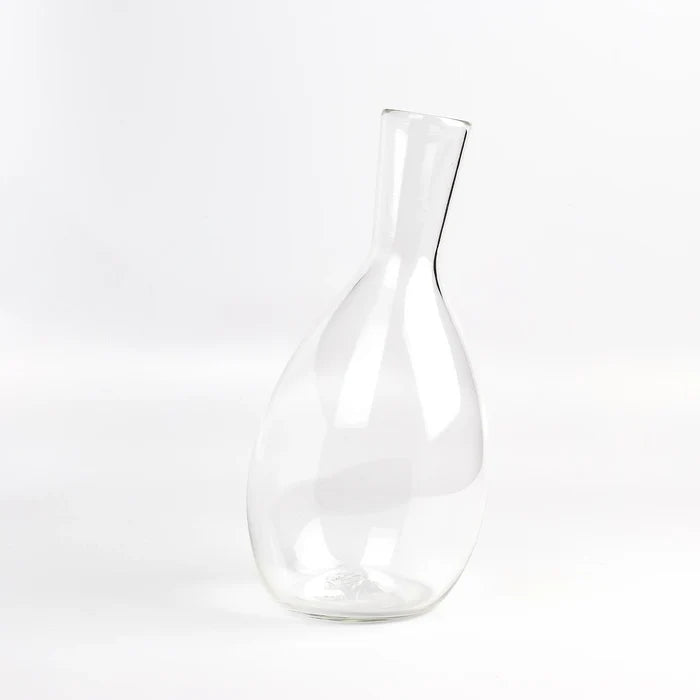 Handblown wine decanter by Nate Cotterman on white background.