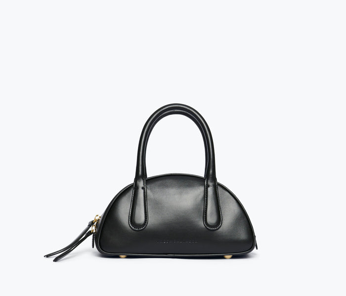 Freda Salvador Harlow Mini Bowling Bag in black calf leather, front view showing compact, stylish design with top handle.