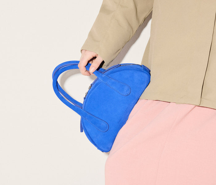 Freda Salvador Harlow Mini Bowling Bag in cobalt blue with sleek leather strap and compact design, perfect for stylish everyday use.