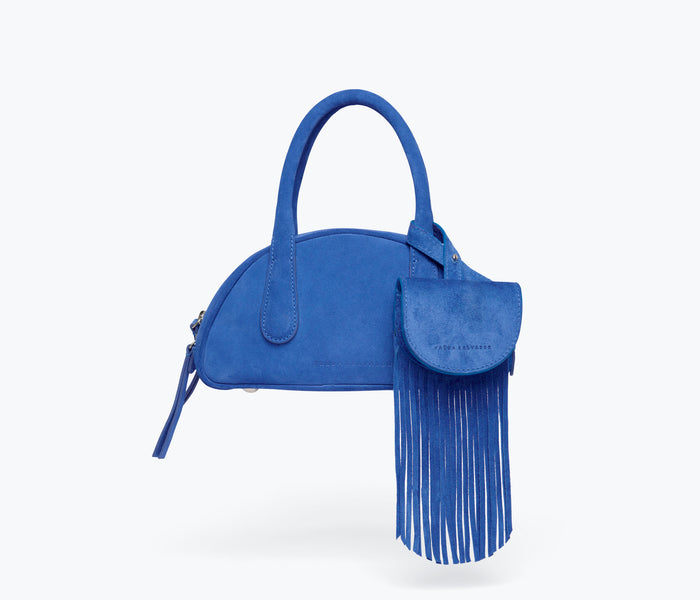 Freda Salvador Joni fringe bag charm in cobalt suede, featuring layered suede fringes and gold hardware.