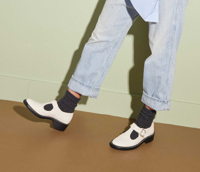 Powder white HELEN T-STRAP LOAFER by FREDA SALVADOR, featuring a classic loafer style with T-strap design and sleek leather finish.