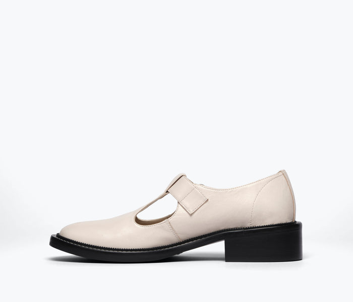 FREDA SALVADOR Helen T-strap loafer in powder white pebbled calf leather, showing the stylish inside and classic design