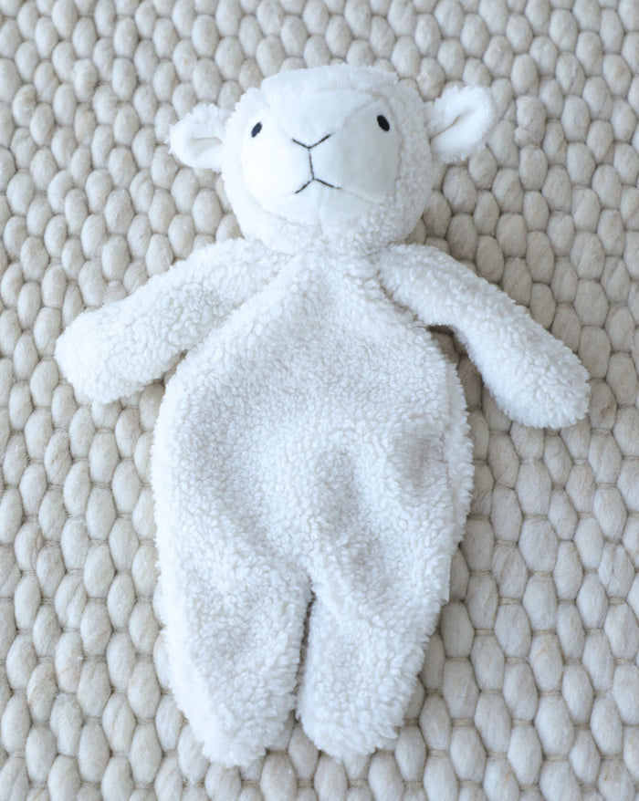 Plush lamb dog toy perfect for Cocker Spaniels, Cavaliers, and Boston Terriers. Fun for chewing or snuggling.