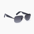The Eddie Bauer Horizon sunglasses feature a modern, rimless rectangular design with UV400 polarized dark lenses and thick black arms, shown on a plain white background.