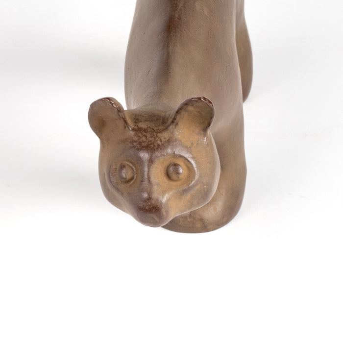Close up on face of  Nambu ironware cat sculpture made by Suzuki Morihisa Studio n Morioka, Japan.