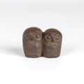 A cast Iron paperweight in the shape of two owls by Suzuki Morihisa. The Suzuki family, now in its 14th generation, started making Nambu Ironware in 1625. Made in Iwate, Japan.