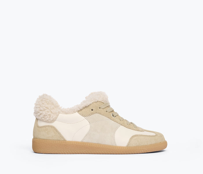 FREDA SALVADOR Jackie Court sneaker in stucco suede with sherling lining, front view showing stylish design and textured material.