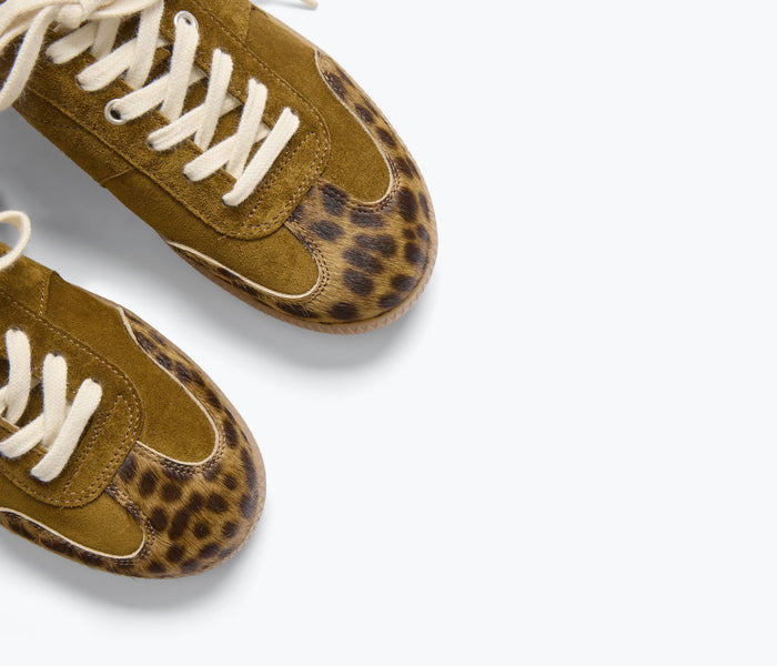 FREDA SALVADOR Jackie Court sneaker in suede with detailed stitching and a sleek, casual design in natural light.