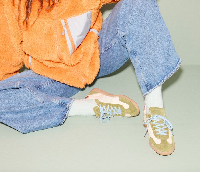 Freda Salvador Jackie Court sneaker in wasabi green suede with white sole and sleek, modern design.