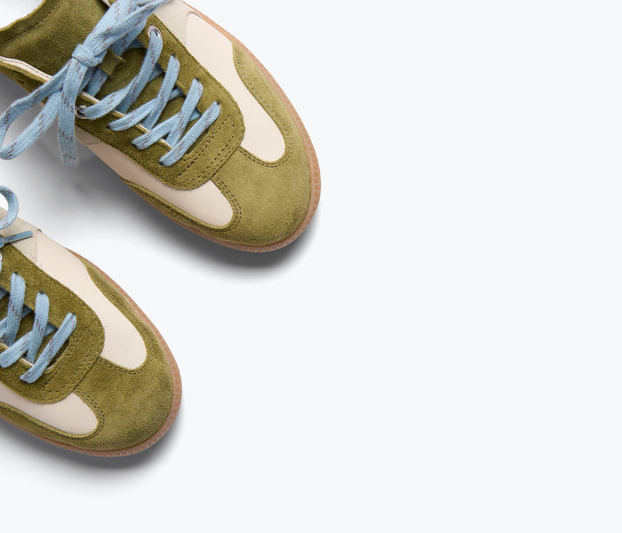 Freda Salvador Jackie Court sneaker in wasabi green suede with detailed stitching and sleek design.