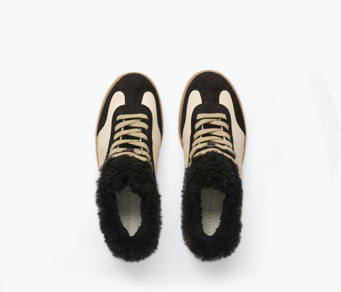FREDA SALVADOR Jackie Court sneaker in black suede with sherling lining, showcasing stylish casual footwear.
