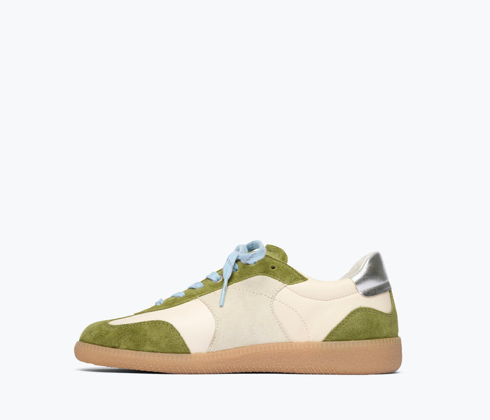 Fredas Salvador Jackie Court sneaker in wasabi green suede, showing the stylish inside view and textured material.