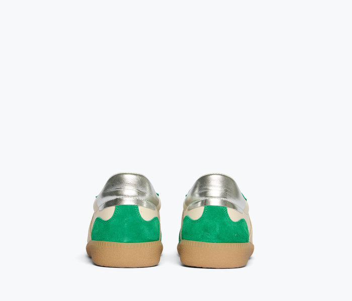 Freda Salvador Jackie Court Sneaker in green suede with a sleek design and white sole, close-up view of the stylish sneaker.