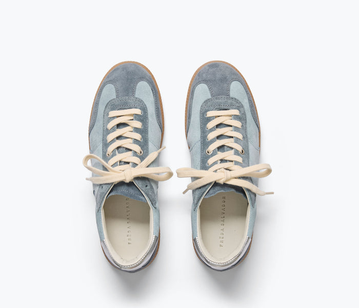 Blue suede FREDA SALVADOR Jackie sneaker with sleek design and comfortable sole, shown from the top view.