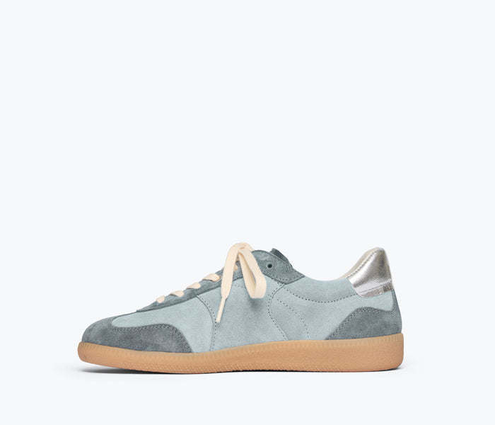 FREDA SALVADOR Jackie sneaker in blue suede with white accents, showcasing stylish casual footwear inside.