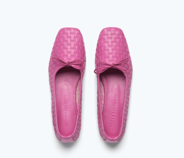 Magenta ballet flat by Freda Salvador with a square toe design, showcasing a sleek, stylish flat shoe on a neutral background.