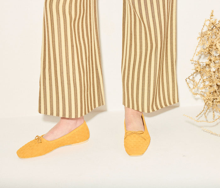 Fredas Salvador JADA square toe ballet flat in marigold woven suede, showcasing its stylish design and textured material.