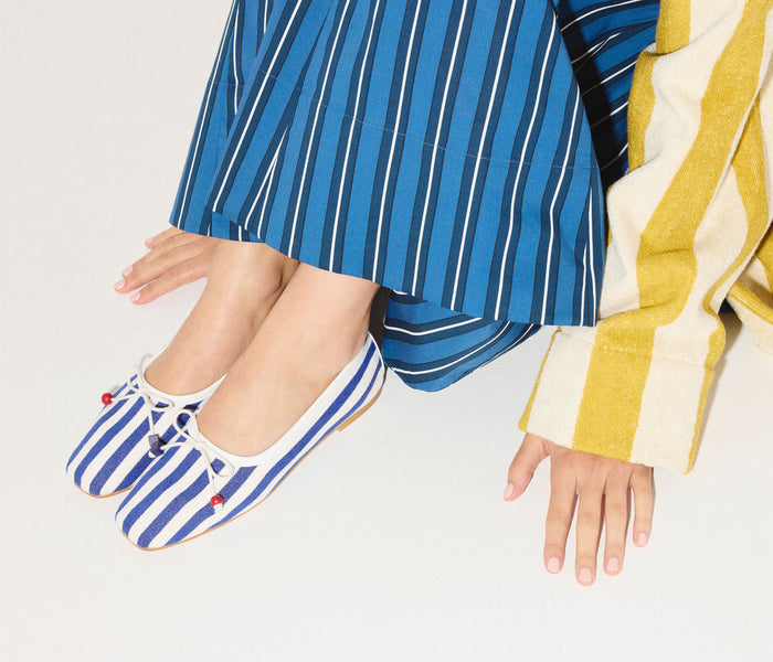 Navy and white canvas JADA square toe ballet flat by Freda Salvador, showing the elegant flat with a sleek square toe design.