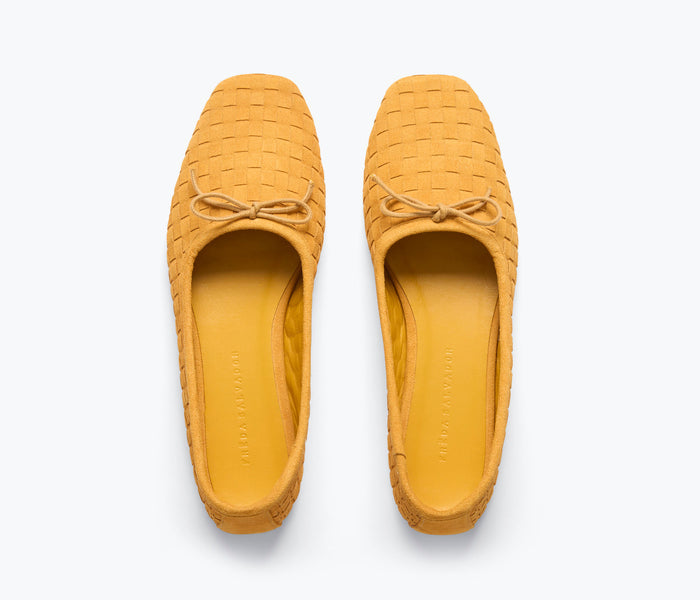 Freda Salvador JADA square toe ballet flat in marigold woven suede with a sleek, flat design and rounded toe shape.