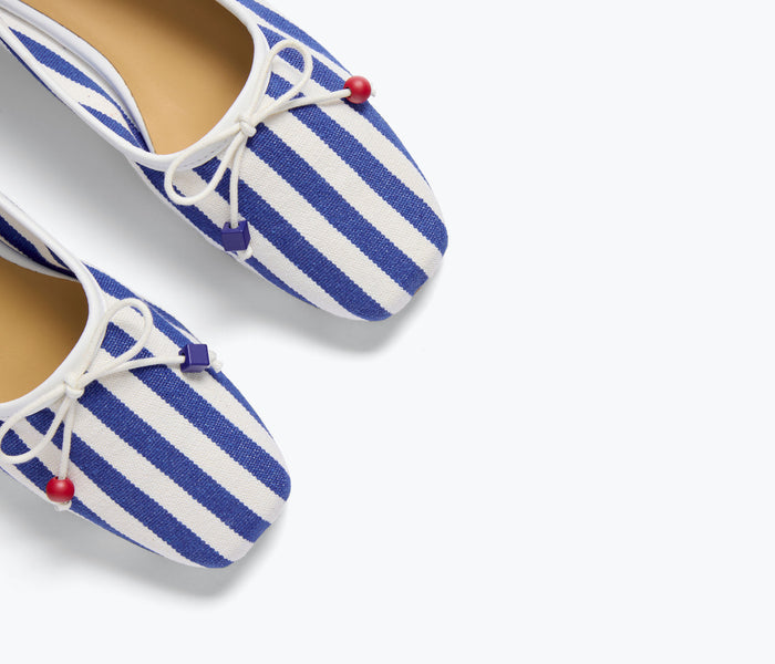 Freda Salvador Jada navy and white canvas square toe ballet flat with a sleek, minimalist design and comfortable flat sole.