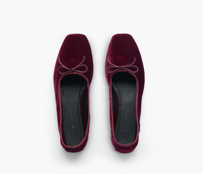 Freda Salvador JADA square toe ballet flat in rich oxblood velvet, showing the stylish flat with a sleek design and soft fabric finish.