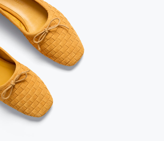 Fredas Salvador JADA square toe ballet flat in marigold woven suede with detailed stitching and a sleek flat design.
