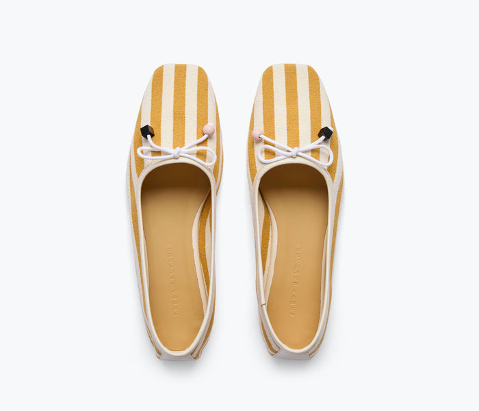 Fredas Salvador JADA square toe ballet flat in mustard yellow and white canvas, showing the top view of the shoe.
